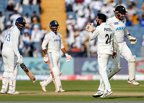 New Zealand's Ajaz Patel and teammates celebrate the wicket of India's Ravindra Jadeja during Day 3 of the second test match, at Maharashtra Cricket Association Stadium in Pune on Saturday.