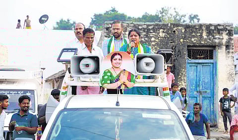 Congress candidate for the Sandur Assembly bypoll E Annapoorna Tukaram addresses voters during an election campaign in Sandur on Tuesday