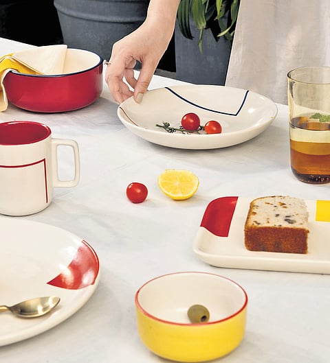 A dual-tinted jug made of borosilicate is a visually commanding sculptural piece. It is the cake stand that takes the cake.