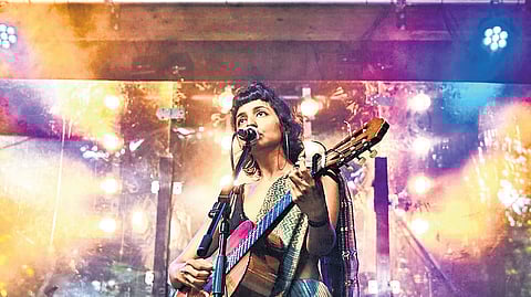 Aditi Veena aka Ditty performing at a concert