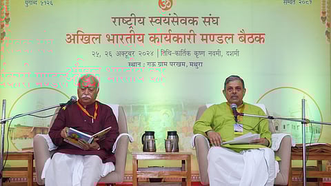 (l-R) RSS chief Mohan Bhagwat and General Secretary Dattatreya Hosabale at the outifit's event at Navdha Auditorium in Mathura on Oct. 25, 2024.