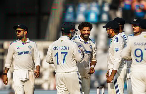 Ravindra Jadeja celebrates with teammates after taking the wicket of Tom Blundell on the second day of the third Test between India and New Zealand (Photo | PTI)