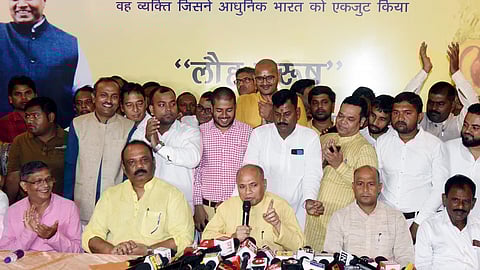 Former Union Minister Ramchandra Prasad Singh (C) announces the new political party 'ASHA' during a press conference in Patna on Thursday, Oct. 31, 2024.