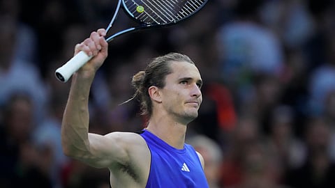 Germany's Alexander Zverev waves to the public after defeating Greece's Stefanos Tsitsipas during their quarterfinal match of the Paris Masters tennis tournament at the Accor Arena.