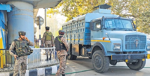 Security personnel cordon off area after a grenade attack by terrorists in Srinagar.