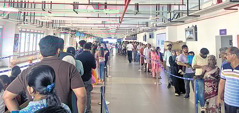 A long queue of commuters waiting to board the Water Metro at High Court terminal on Thursday