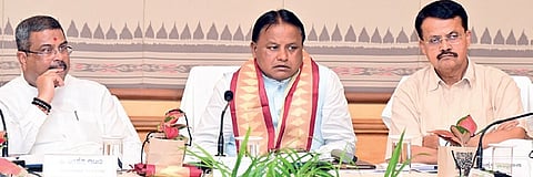 CM Mohan Majhi, Union minister Dharmendra Pradhan and MP Bhartruhari Mahtab at the high-power committee meeting in Bhubaneswar, on Sunday