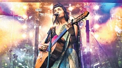 Aditi Veena aka Ditty performing at a concert