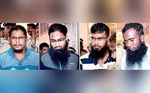 Convicted Abbas Ali, Karim Raja, Dawood Sulaiman and acquitted Shamsuddeen in the Kollam Collectorate bomb blast case