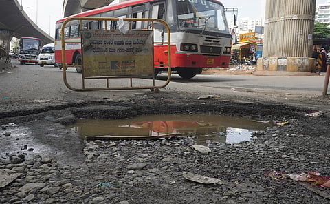 A bus lane in front of Jalahalliu metro station was seen as severely damaged, with large potholes; Image used for representative purposes