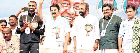 Actor Mammootty greets the students gathered at the Maharaja’s College Stadium. Olympic medallist P R Sreejesh, Education Minister V Sivankutty, Kochi Mayor M Anilkumar and MP Hibi Eden are also seen