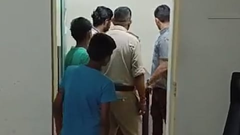 Police investigating at AAP office in Ahmedabad.