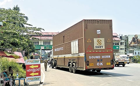 A container lorry being intercepted by the police just before the Kumbalam toll plaza on Tuesday
