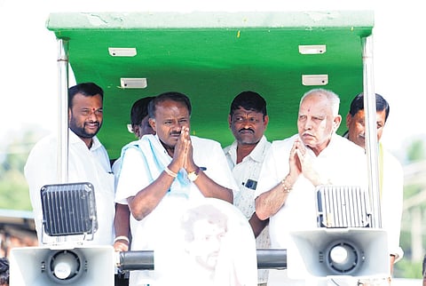 Union Minister HD Kumaraswamy and former CM BS Yediyurappa campaign for Nikhil Kumaraswamy at Ambadahalli in Channapatna on Wednesday
