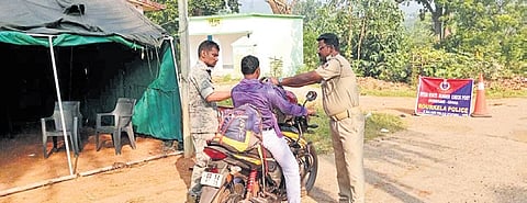 Police personnel checking vehicles in Rourkela