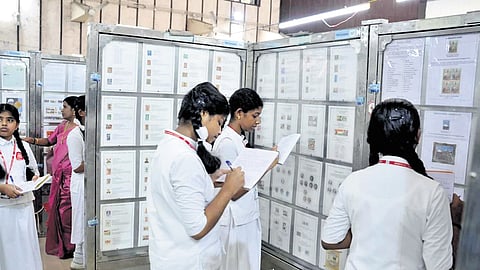 Students jotting down details at the district-level philately exhibition ‘Periyar Pex 2024’, organised by the postal department, held at Mahatma Gandhi Municipal Town Hall, Aluva. The expo featured unique and rare stamps and collections by philatelists from across the world