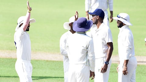 Assam players celebrate a wicket on Day 2 of their Ranji Trophy match against Tamil Nadu on Thursday.