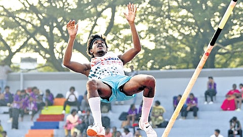 Sivadev Rajeev of Mar Basil HSS, Kothamangalam, competing in the pole vault senior boys category at the Kerala State School Sports Meet at Maharaja’s College ground in Kochi on Thursday. He broke the meet record