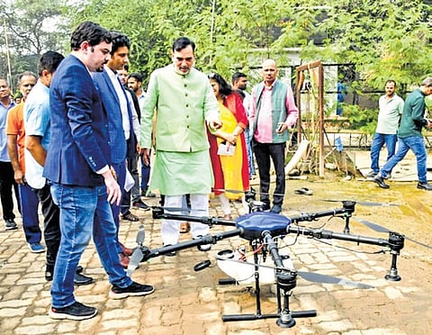 Gopal Rai at the trial run of the drone-based mist spraying