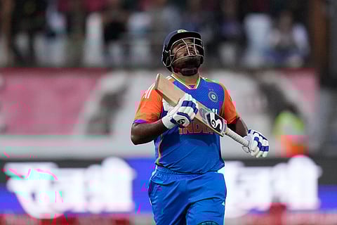 Sanju Samson looks up as he celebrates his century during the T20 International cricket match between South Africa and India, at Kingsmead stadium in Durban, South Africa, Friday, Nov. 8, 2024.