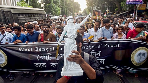 Junior doctors under the banner of West Bengal Junior Doctors' Front take out a rally to demand justice for the alleged rape and murder of a woman medic at R G Kar Medical College and Hospital, marking three months of the incident, in Kolkata, Saturday, Nov 9, 2024.