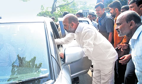 MoS Home, Bandi Sanjay, ensures that the woman who was trapped under a moving lorry is shifted to a hospital in Karimnagar, on Wednesday
