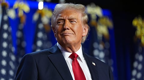 Republican presidential nominee former President Donald Trump arrives at an election night watch party at the Palm Beach Convention Center, Wednesday, Nov. 6, 2024, in West Palm Beach, Florida.