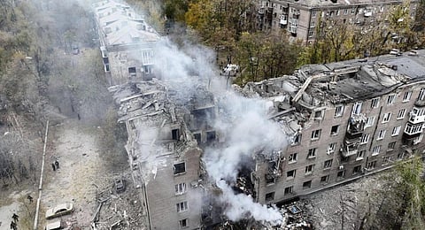In this image provided by the Ukrainian Emergency Service on Monday, Nov. 11, 2024, a smoke rises out of an apartments building after a Russian attack in Kryvyi Rih, Ukraine.