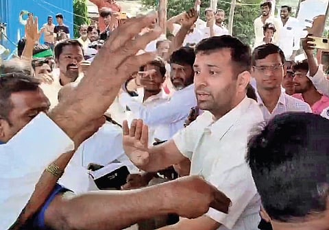 Residents of Lagcherla village mob Vikarabad Collector Prateek Jain and KUDA officials during their protest against proposed pharma unit on Monday