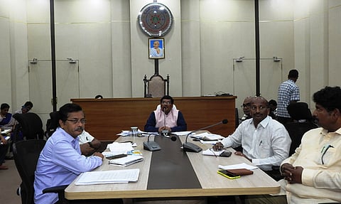 GMC commissioner addressing a meeting with street vending zone committees, and vendors committee members.