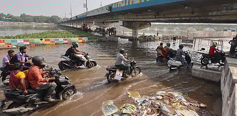 The people travelling in vehicles at the vaigai south bank road are facing difficulties since Vaigai River water has started to overflow under yanaikkal bridge following the rainfall and release of water from Vaigai dam