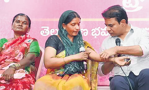 A woman from Lagcherla shows her injury marks to BRS working president KT Rama Rao in Hyderabad on Thursday