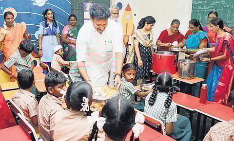 The ministers inspecting the government school at GKM Colony in Kolathur | Express