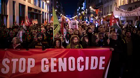 Protesters take part in a rally against the "Israel is Forever" gala organized by far-right Franco-Israeli figures, in Paris, Wednesday.