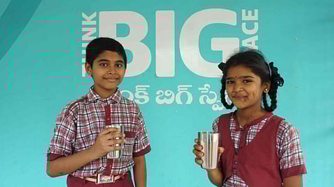 Students drinking the morning free nutritious drink