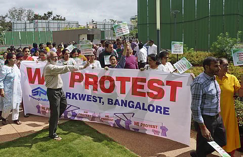 Residents of Shapoorji Pallonji Parkwest Apartments in Binnypet staged a protest on Tuesday