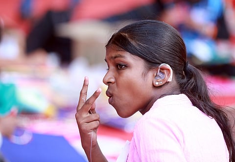 Differently abled students interacting sign languages during the work experience category at the state school science fair at Alappuzha