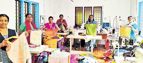 Women making cloth bags at a Kudumbashree stitching unit