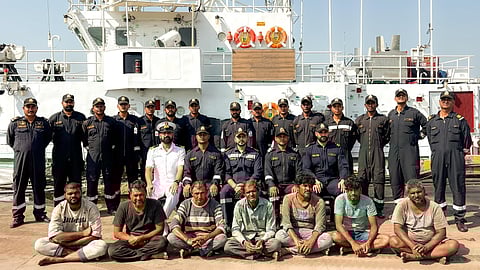 Indian Coast Guard with the seven rescued fishermen.