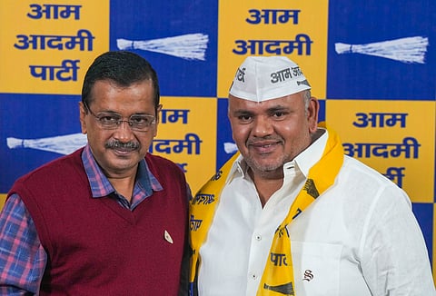 AAP convenor Arvind Kejriwal welcomes former Congress leader Sumesh Shokeen as he joins AAP, in New Delhi, Monday, Nov. 18, 2024.
