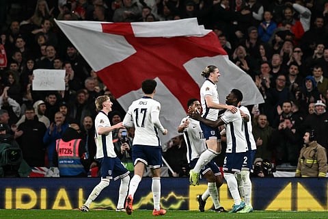 England's midfielder Conor Gallagher (2R) celebrates scoring the team's third goal during the UEFA Nations League, League B - Group 2, football match between England and the Republic of Ireland at Wembley Stadium in London on November 17, 2024.