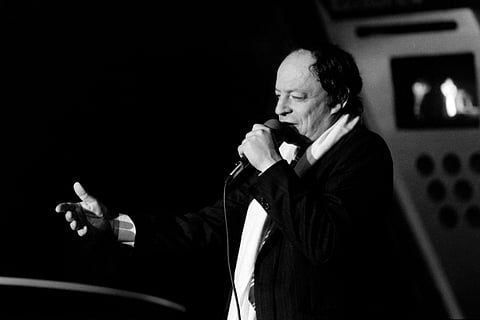 Photo taken on January 24, 1984 shows French singer Charles Dumont during a radio show on the radio station network Europe 1 in Paris.