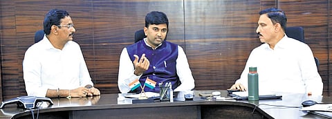 MP Kesineni Sivanath and Vijaywada West MLA Sujana Chowdary holding talks with VMC Commissioner HM Dhyanachandra