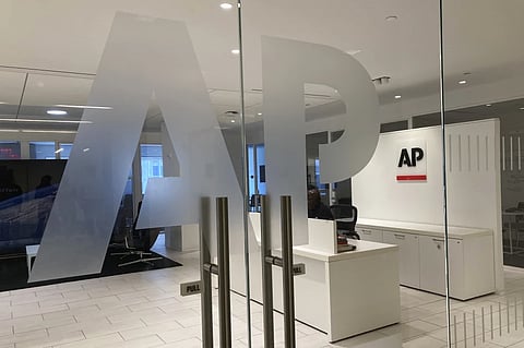 The Associated Press logo is shown at the entrance to the news organization’s office in New York on Thursday, July 13, 2023.