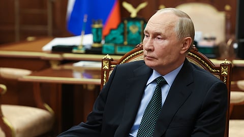 Russian President Vladimir Putin listens to Moscow-appointed head of Russian-controlled Zaporizhzhia region of Ukraine, Yevgeny Balitsky during their meeting at the Kremlin in Moscow, Russia, Monday, Nov. 18, 2024.