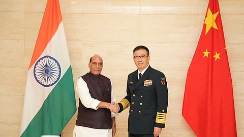 Union Defence Minister Rajnath Singh with the Defence Minister of China Admiral Dong Jun in Vientiane, Lao.