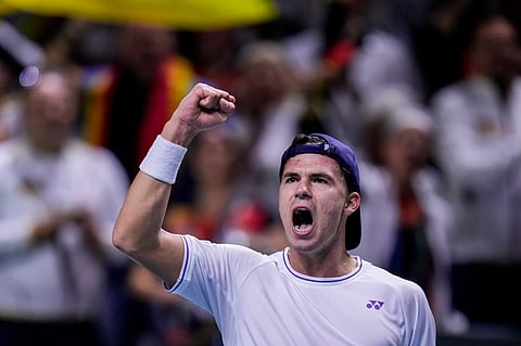 Germany's Daniel Altmaier celebrates his victory against Canada's Gabriel Diallo during a Davis Cup quarterfinal match at the Martin Carpena Sports Hall, in Malaga.