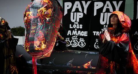 Activists participate in a demonstration for climate finance at the COP29 U.N. Climate Summit, Wednesday, Nov. 20, 2024, in Baku, Azerbaijan.