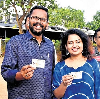 LDF candidate P Sarin and wife Dr Soumya after casting their votes at True Line Public School in Manappullikkavu