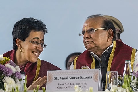 Delhi Lt. Governor Vinai Kumar Saxena and Chief Minister Atishi during the 7th Convocation of the Indira Gandhi Delhi Technical University for Women (IGDTUW), in New Delhi, Friday, Nov. 22, 2024.